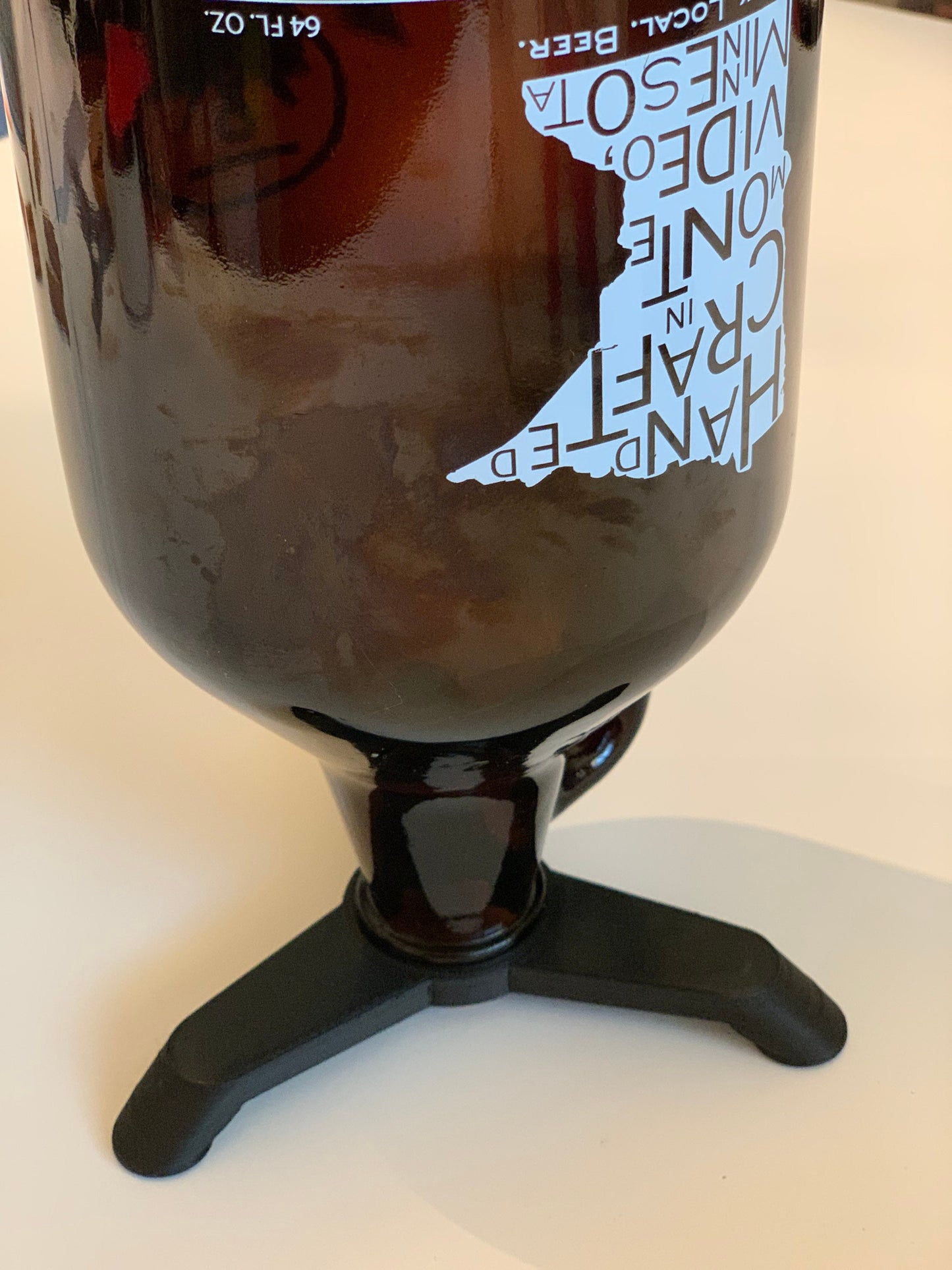 64 oz Beer Growler Drying Stand holding an upside-down growler