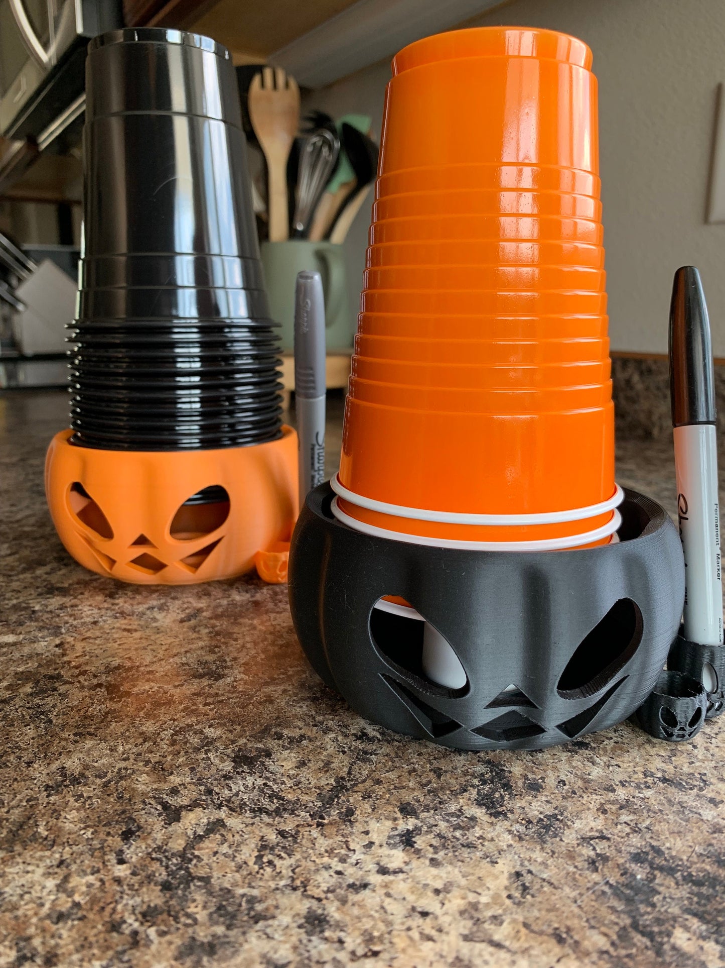 Close-up view of durable plastic Pumpkin Party Cup Holder designed for 14, 16, and 18 oz cups.