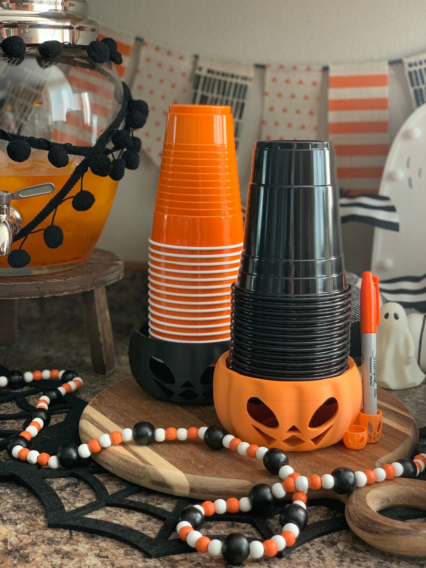 Pumpkin Party Cup Holder with LED tea light and built-in pen holder, perfect for Halloween and Summerween parties.