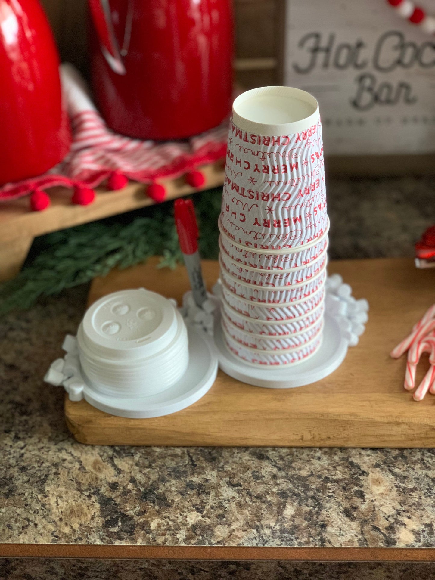 Close-up of a Party Cup and Marker Holder showcasing its unique slot design and holiday charm.
