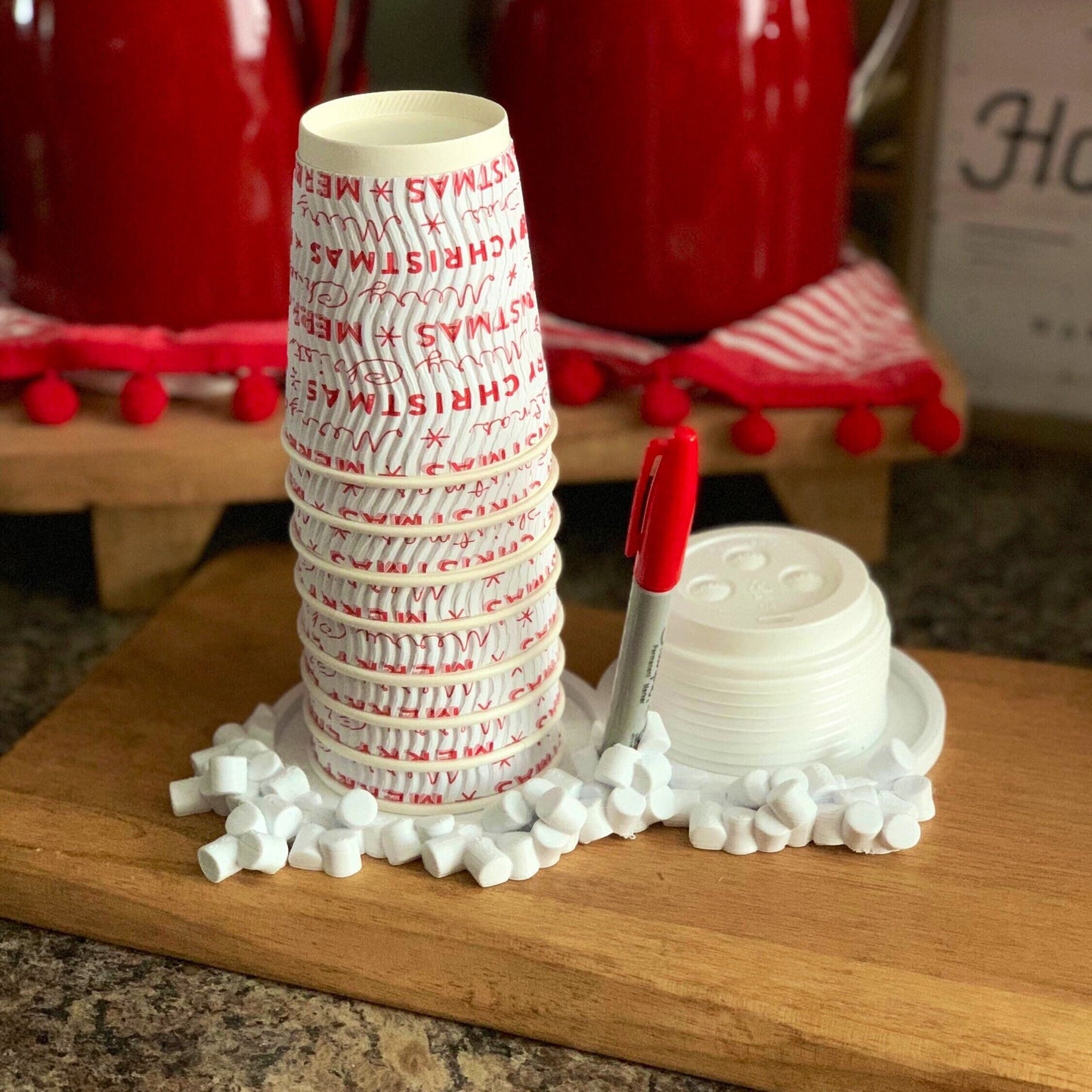 Close-up of a Party Cup and Marker Holder showcasing its unique slot design and holiday charm.