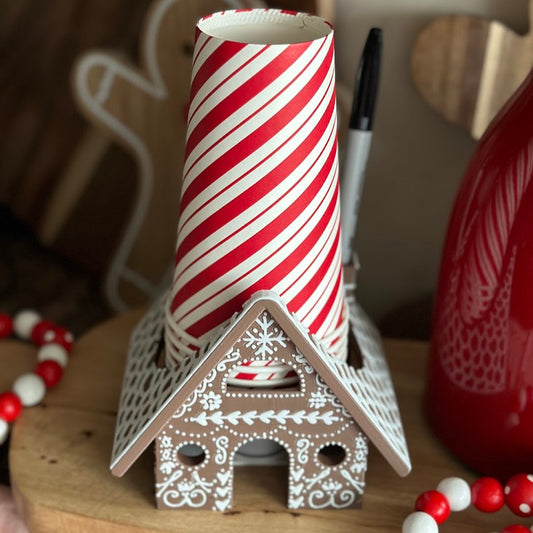 Gingerbread House Party Cup Holder Front View – A festive gingerbread house-themed cup holder with a marker slot, perfect for Christmas parties and hot cocoa bars.