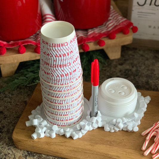 Close-up of a Party Cup and Marker Holder showcasing its unique slot design and holiday charm.